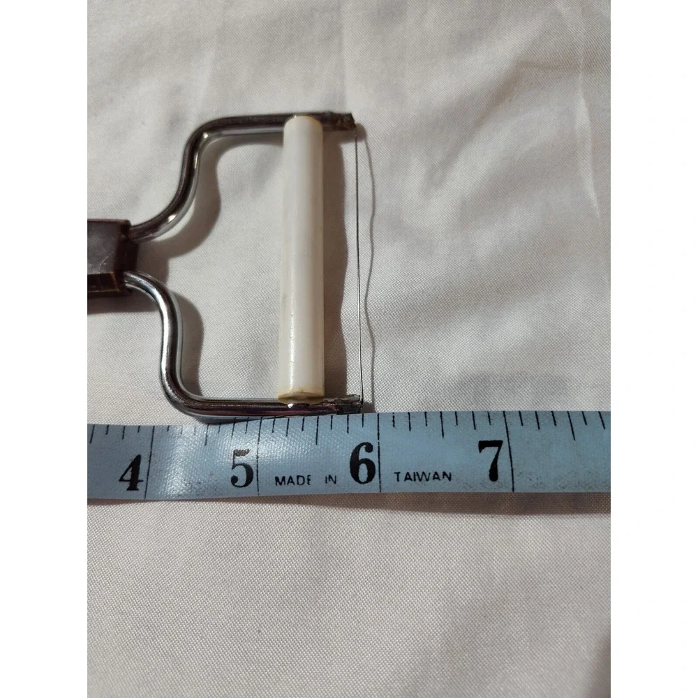 Travco brown daisy cheese slicer movie prop MCM FLAWS